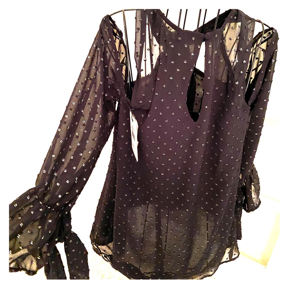Black Bardot shoulder cut out blouse.
